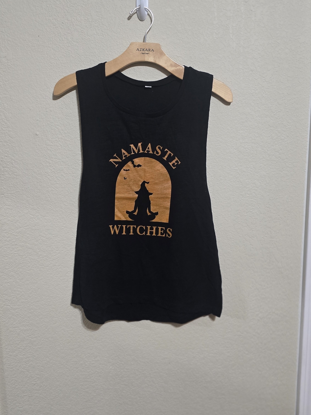 Women's Black Graphic Tank Top with Orange 'Namaste Witches' Print